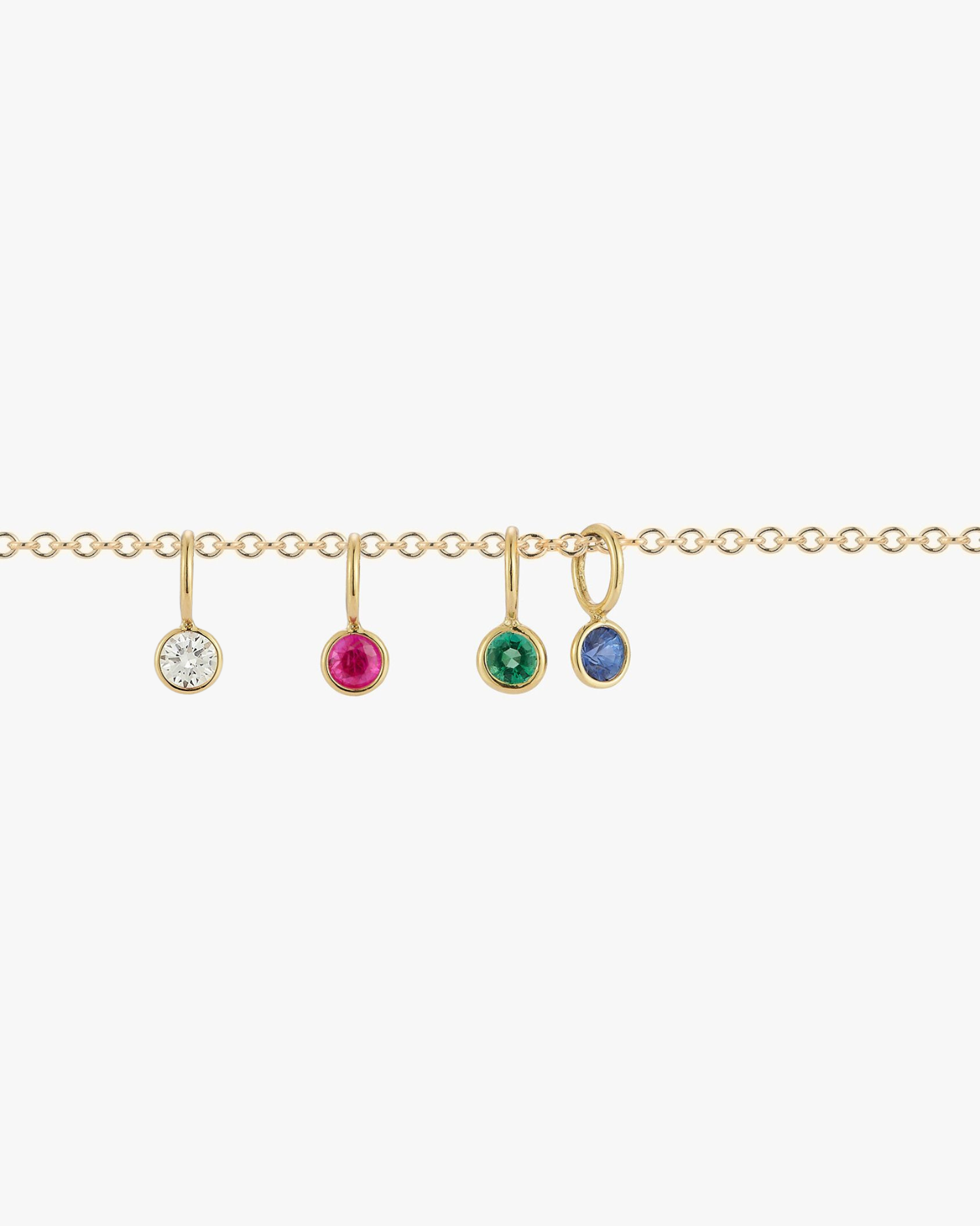 14k gold chain showing four love billy gemstone drops. Diamond, ruby, emerald and sapphire