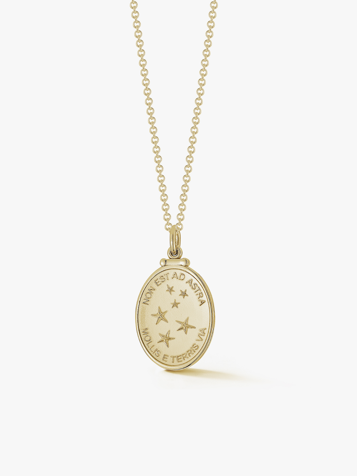 Gold stars medallion necklace. Engraved with Non est ad astra mollis e terris via which means there is no easy way from the earth to the stars. Made by love Billy.