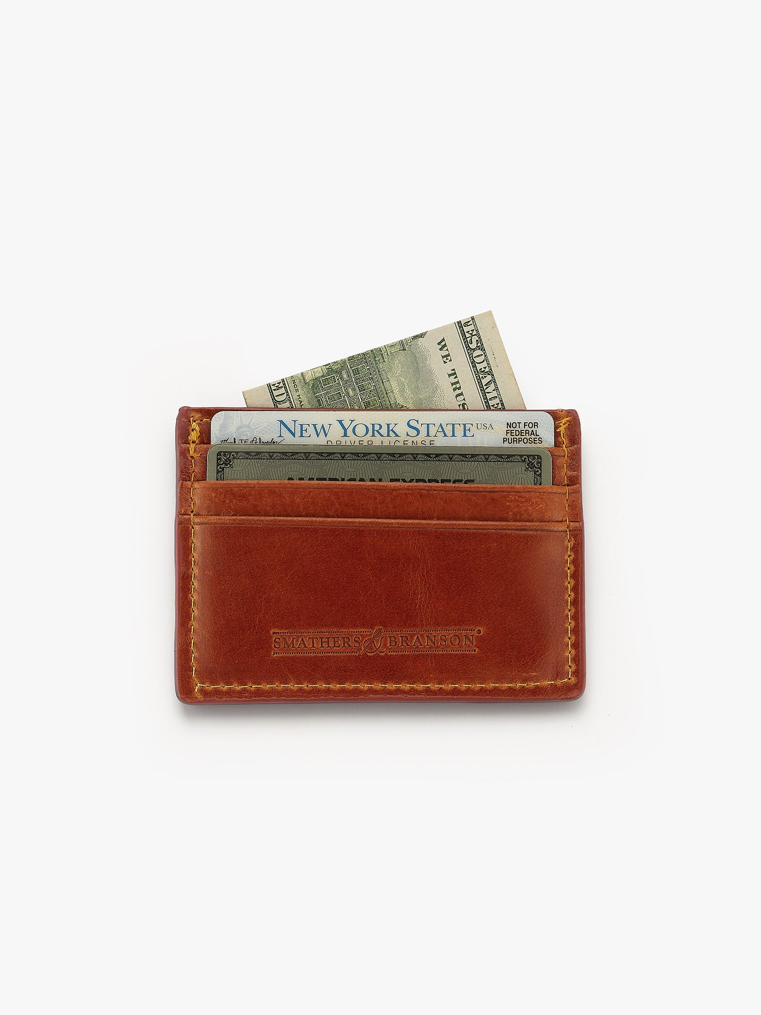 Brown leather wallet with money and a New York State license in pocket. Smathers & Branson wallet. Love Billy.