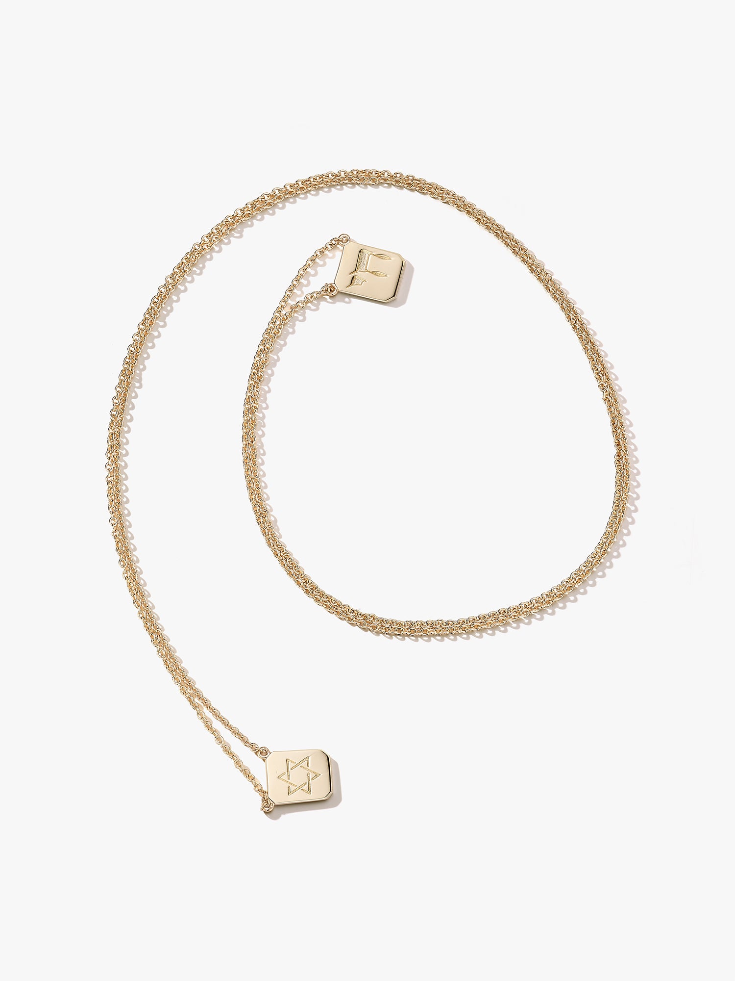 Personalized Love Billy gold tag necklace. one chai and one star of david.