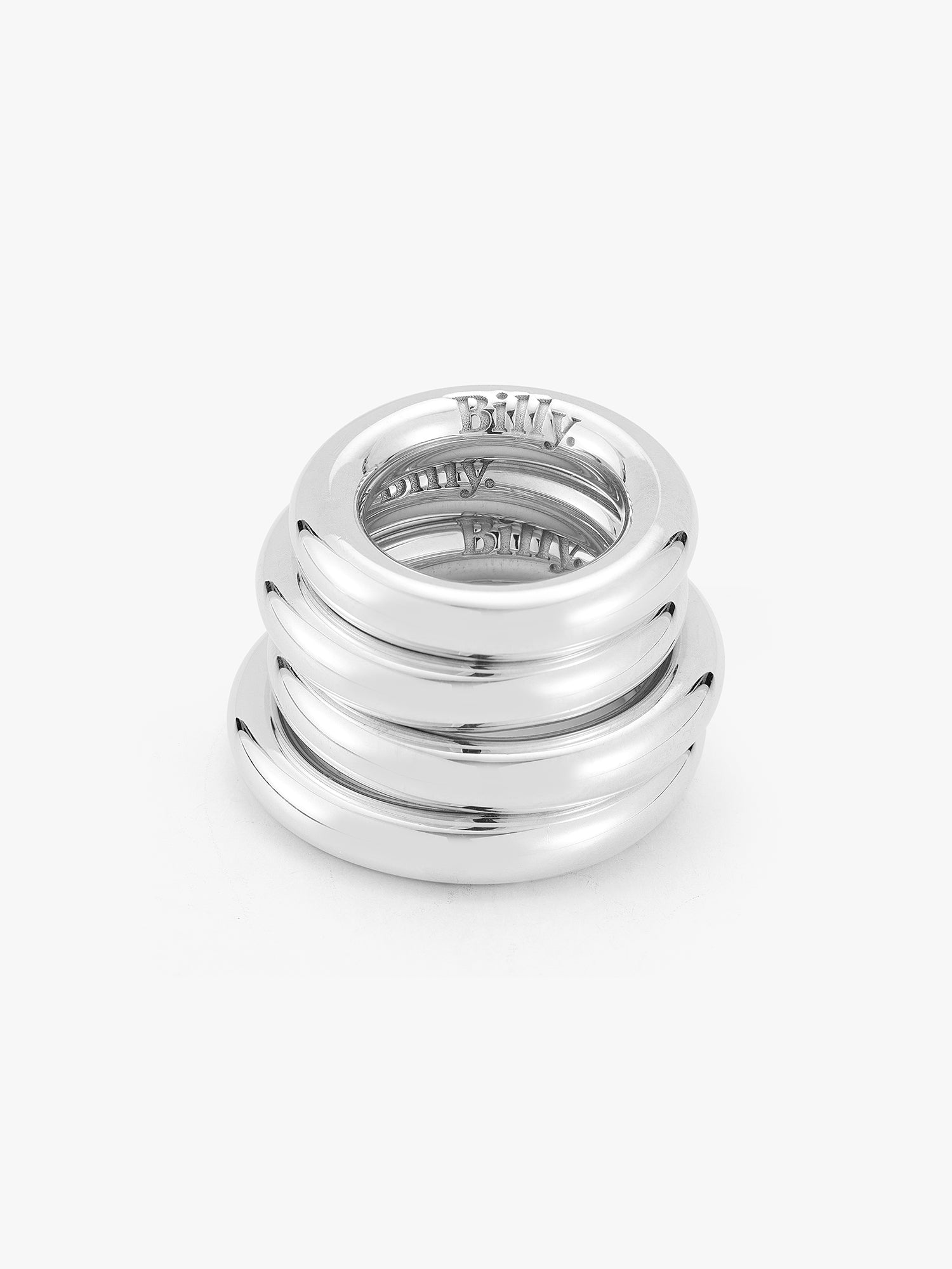 stack of chunky silver carousel rings by love billy.