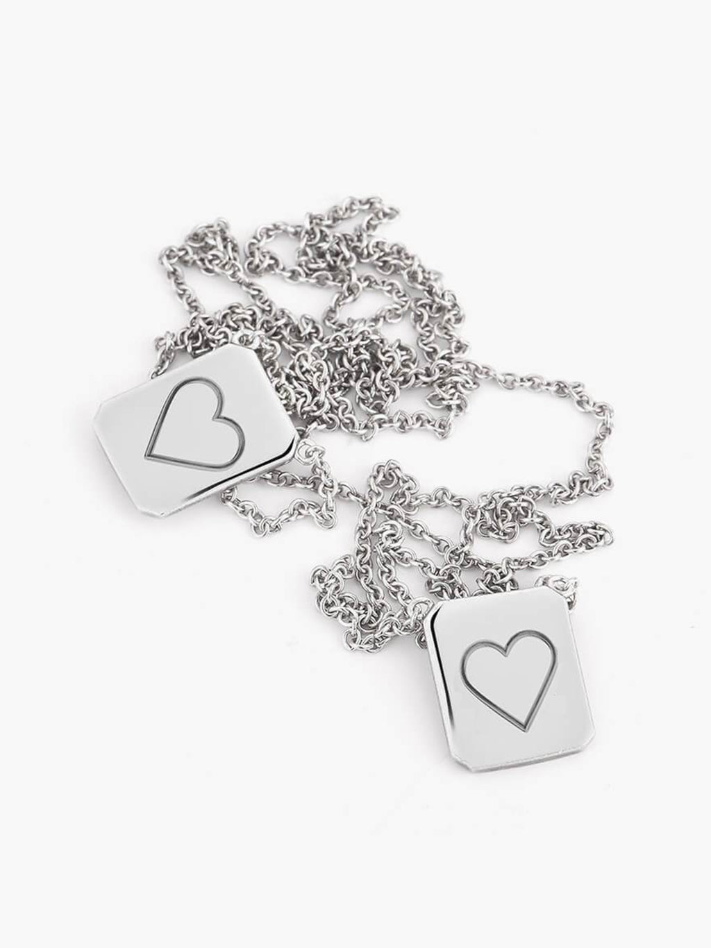 Bundled up personalized Love Billy silver heart tag necklace.