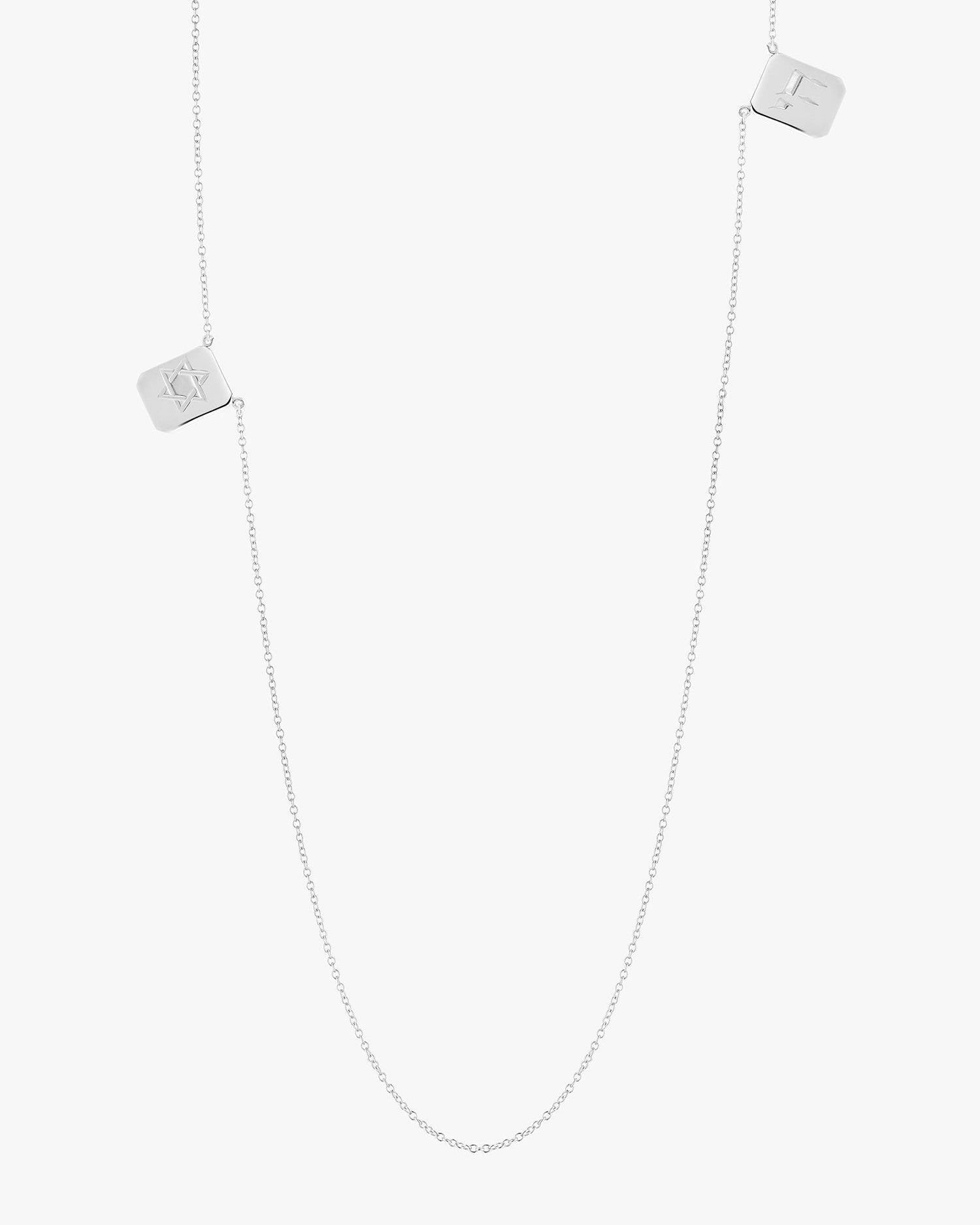 Personalized Love Billy silver tag necklace. one chai and one star of david.