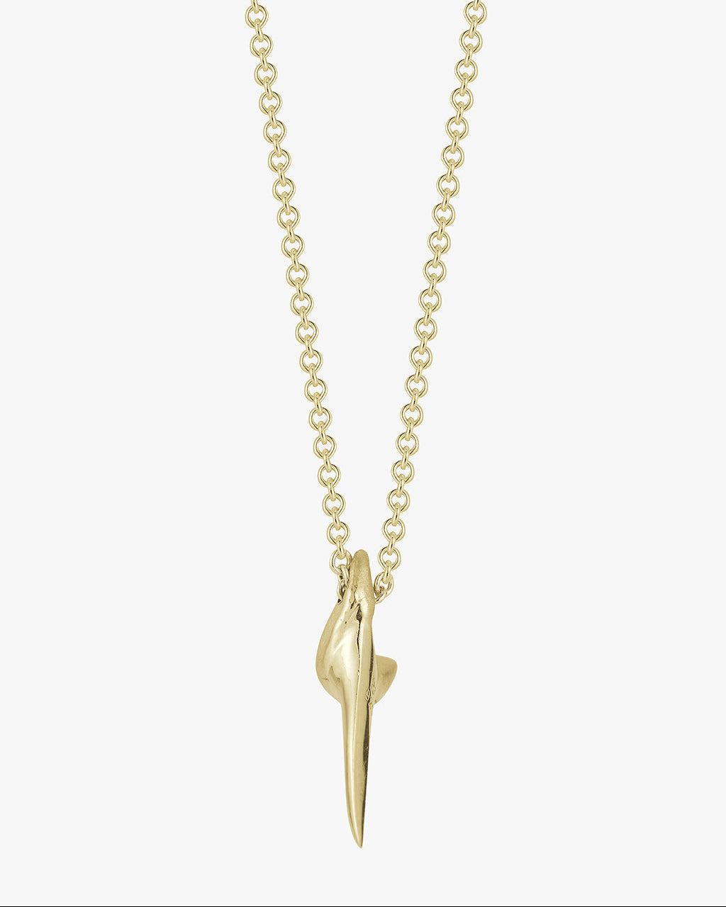 side close up angle of a gold shark tooth necklace made by Love Billy in NYC.