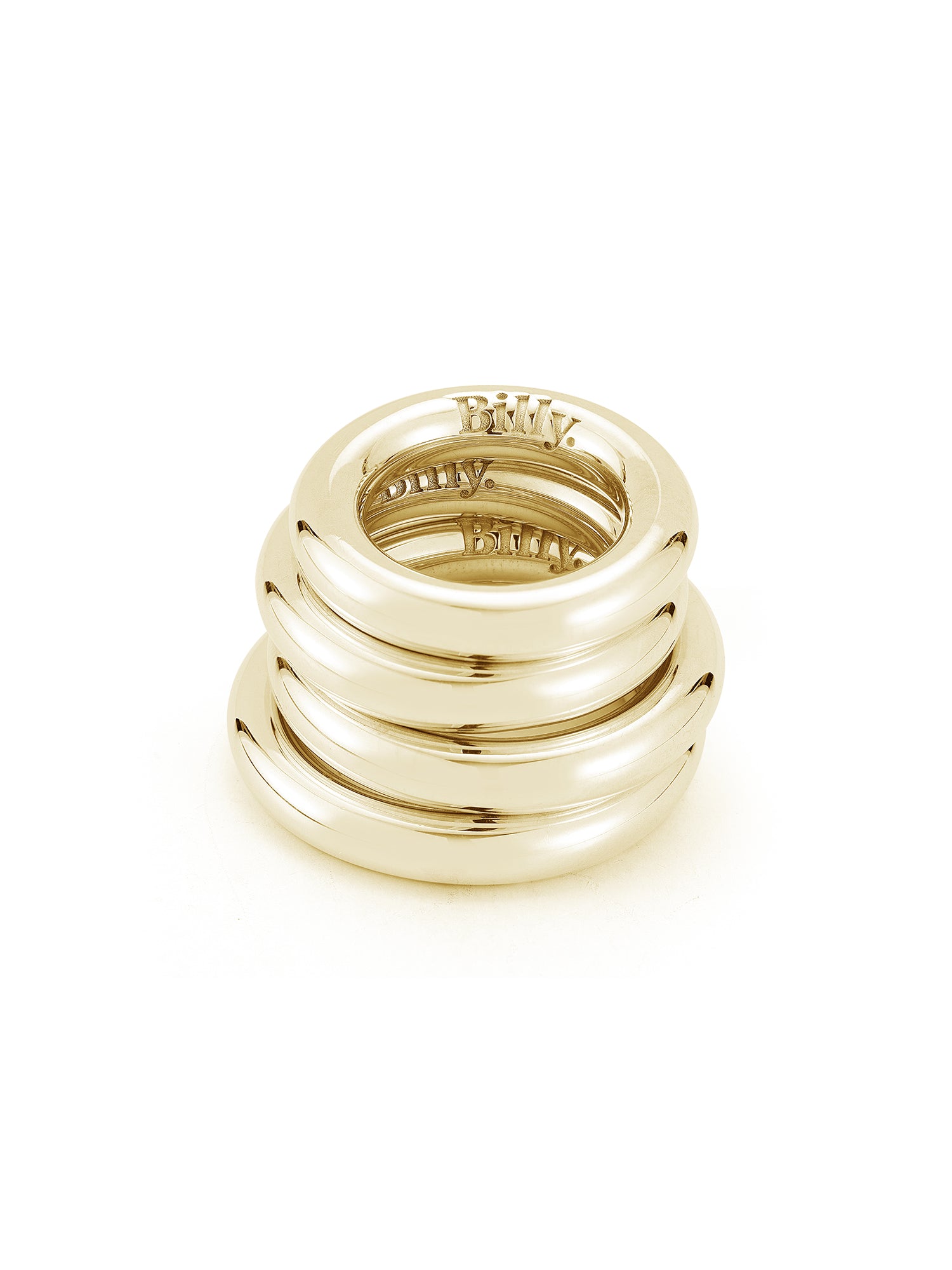 stack of solid gold carousel rings by love billy