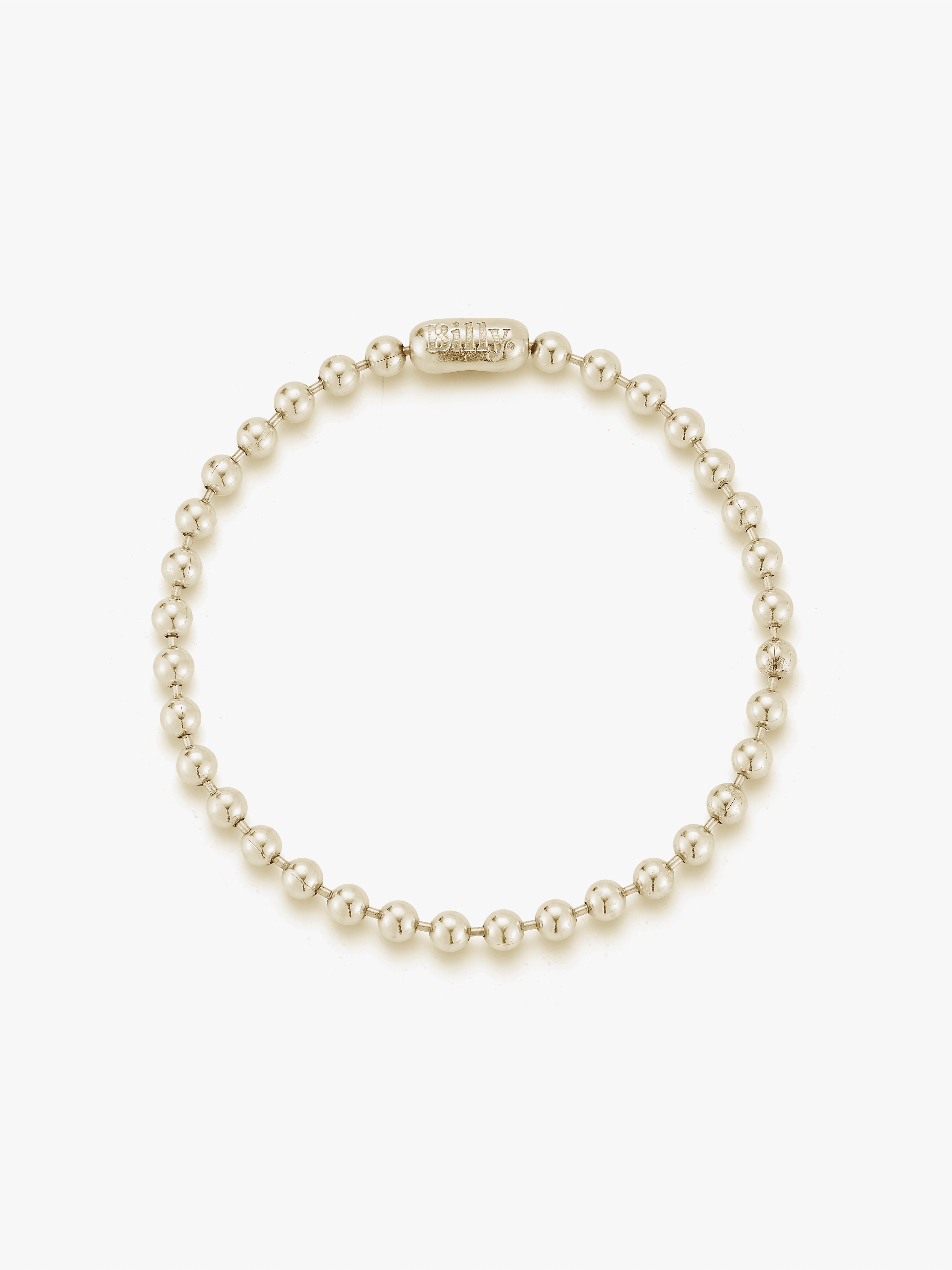 14k gold ball chain bracelet with a pill clasp engraved with the Billy logo