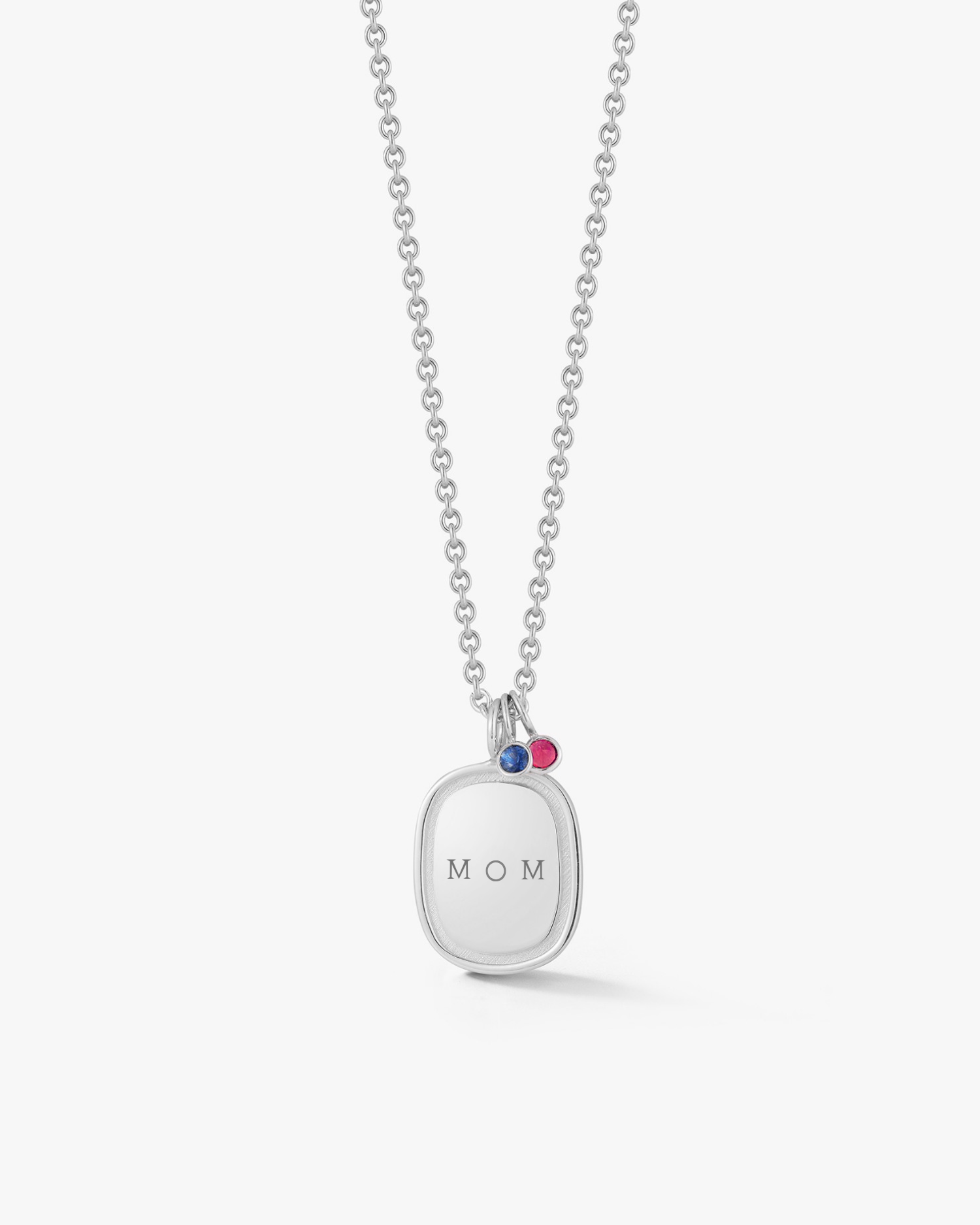 Silver necklace with a 'MOM' pendant on a white background