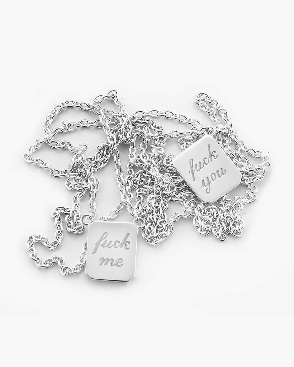 silver love billy tag necklace with fuck you and fuck me charms on it