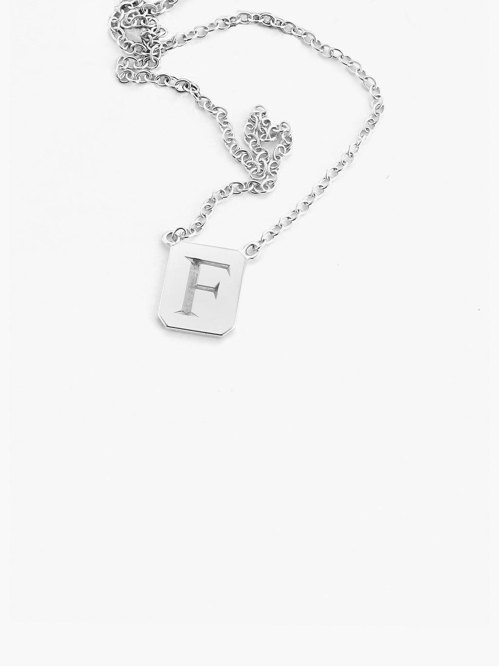 Close up of personalized silver tag necklace by love billy.