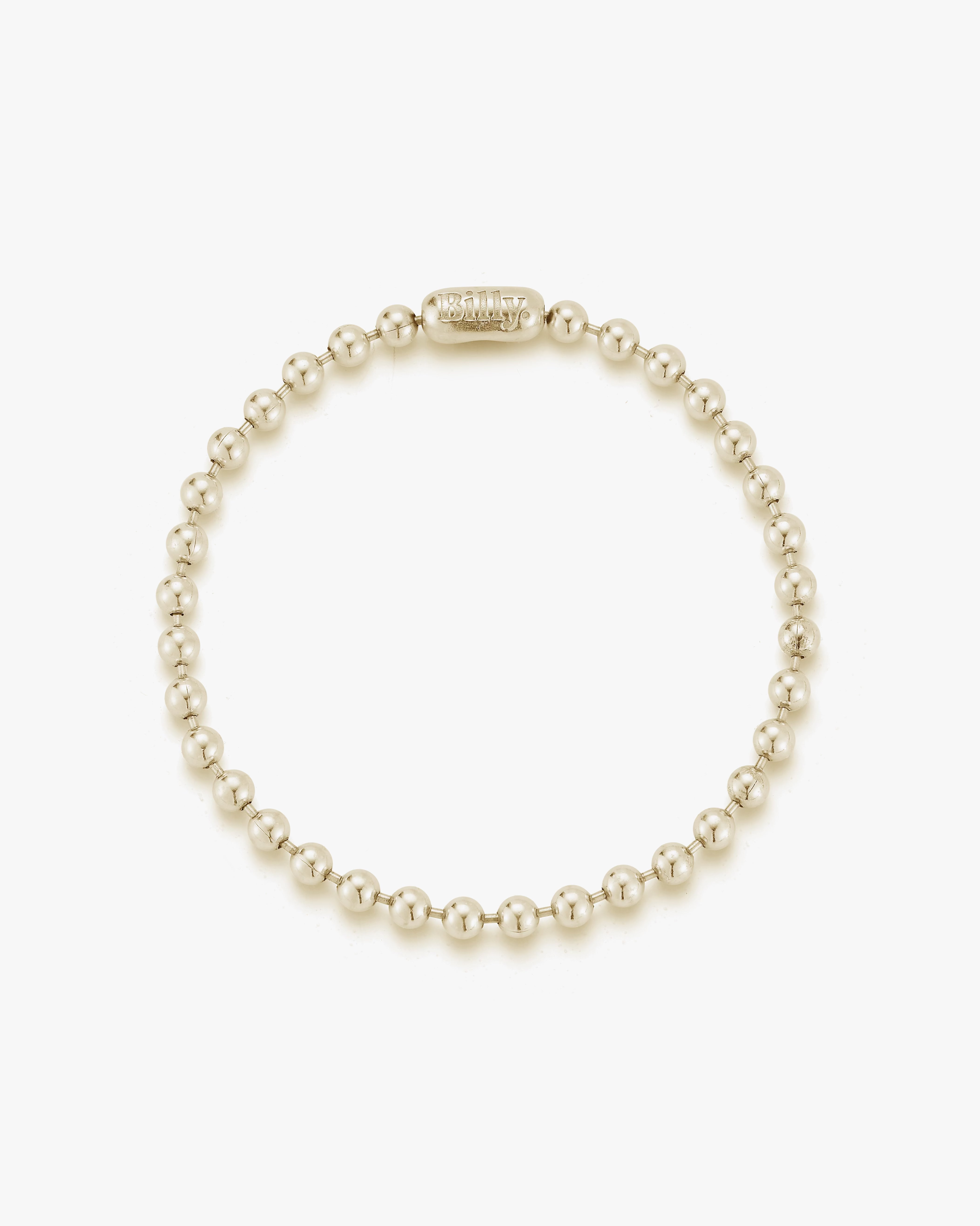 14k gold ball chain bracelet with a pill clasp engraved with the Billy logo