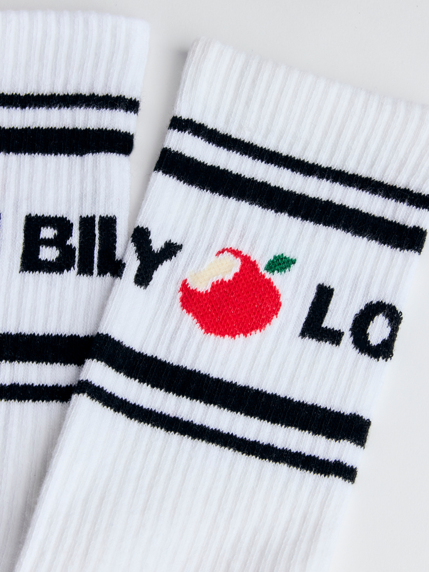 closeup of the love billy tube socks.