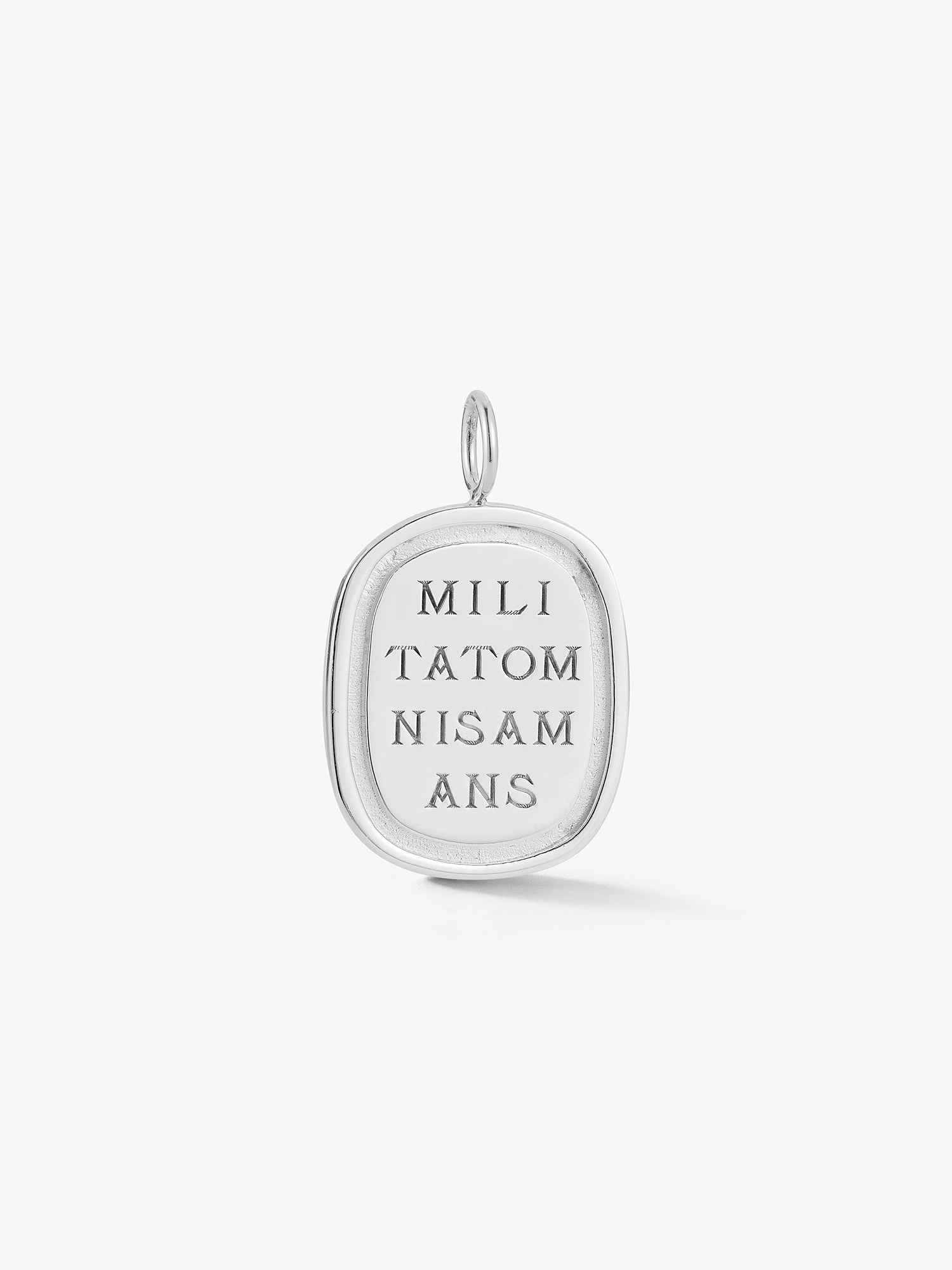 Silver pendant with engraved text"militatomnisamans" on a white background. Engraving loosely translates to every lover is a solider