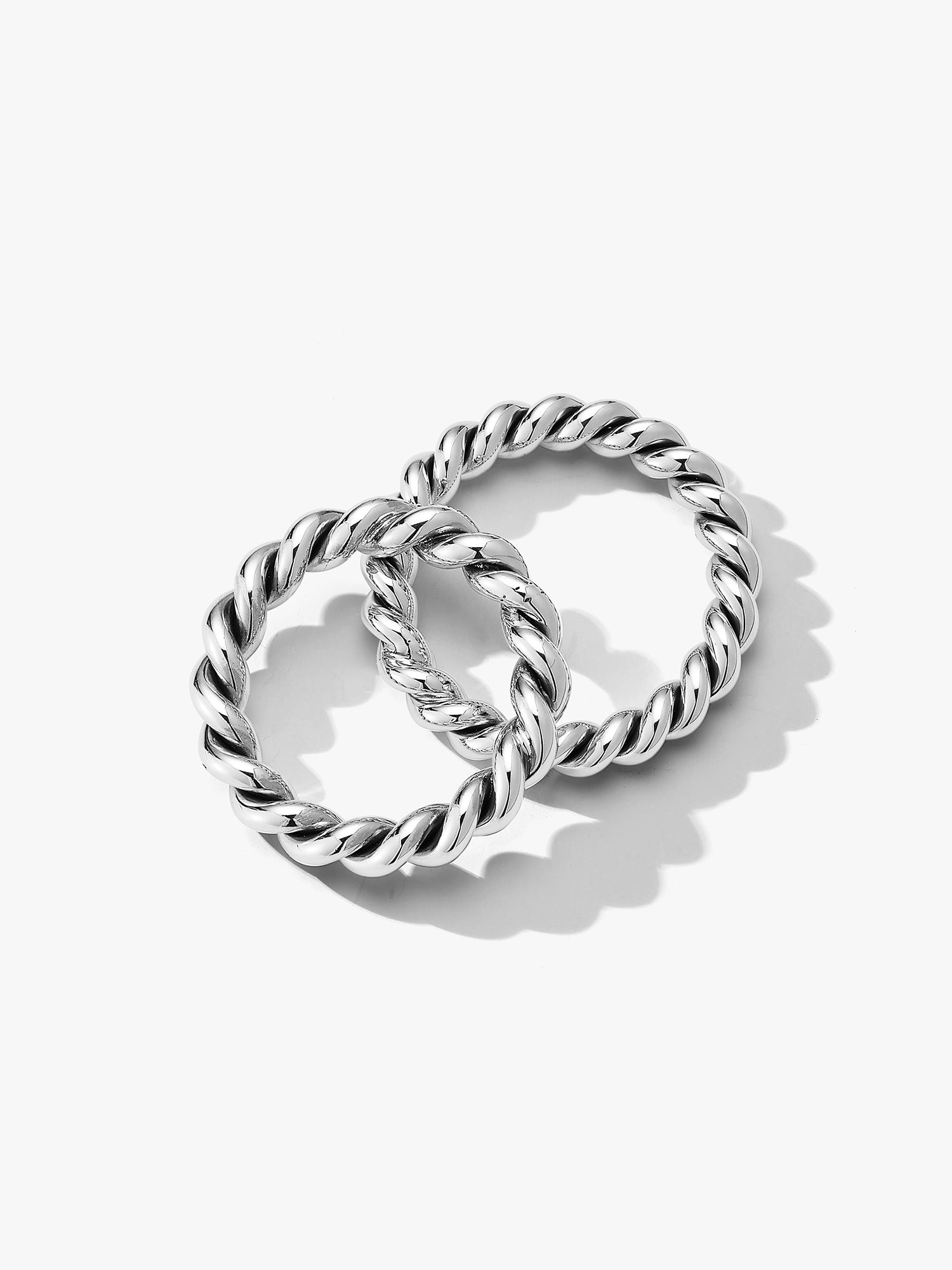 Two Twisted Carousel Rings, characterized by its distinctive twisted design. Silver and engraved with Billy on the inside. Made in NYC. 